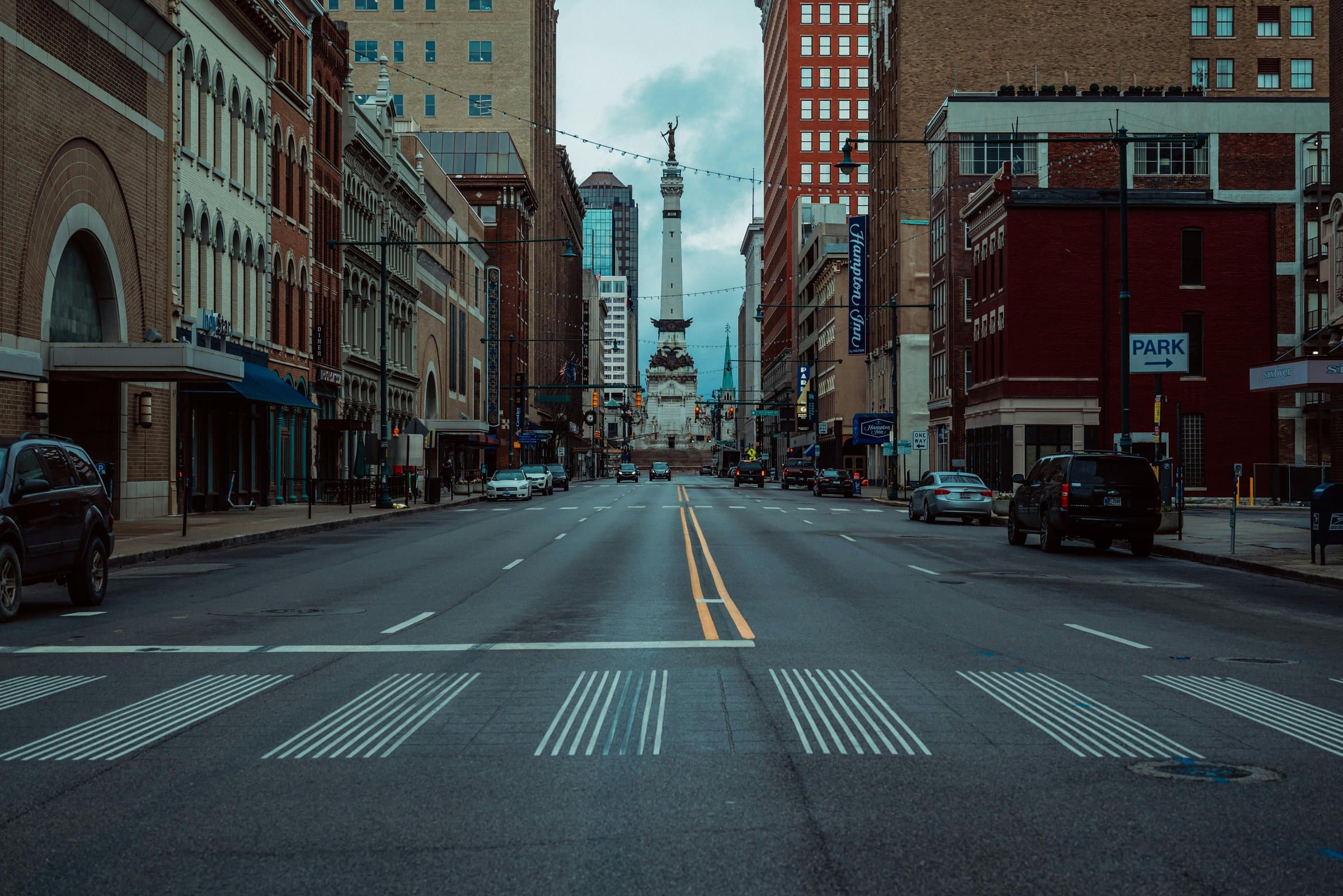 Downtown Indianapolis street framing the Soldiers' and Sailors' Monument
